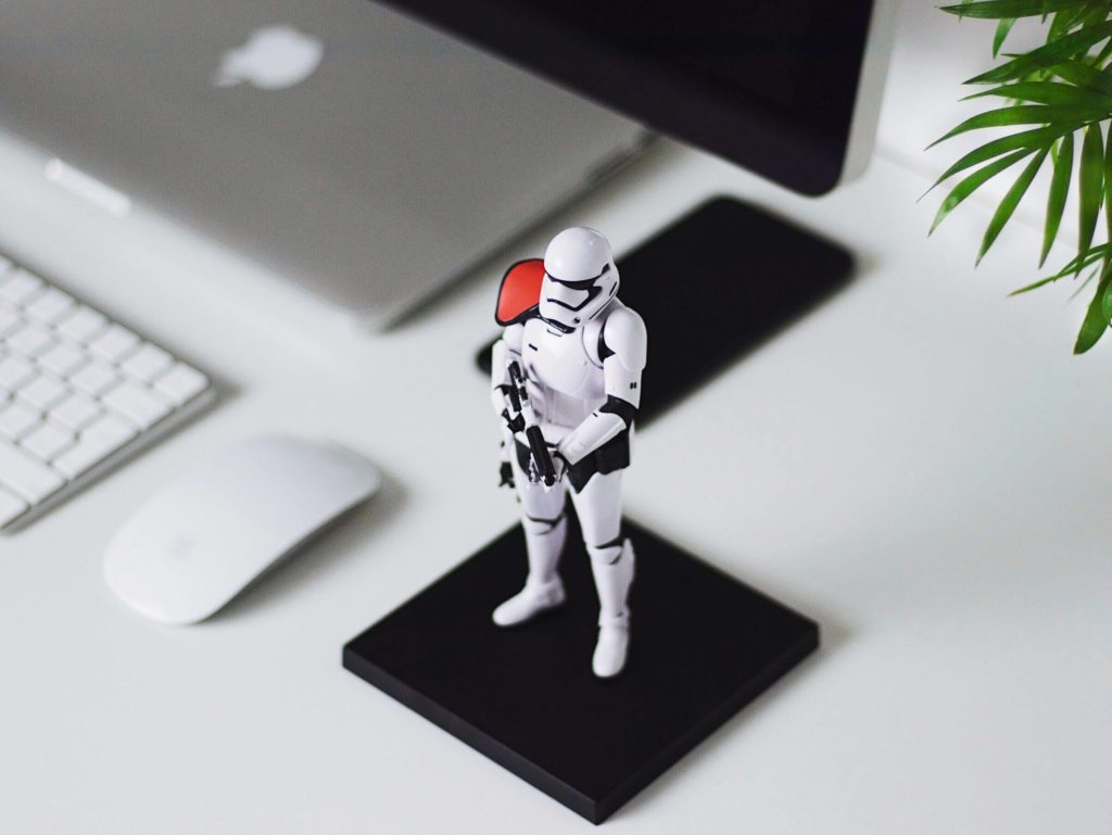 Star Wars figurine next to mouse